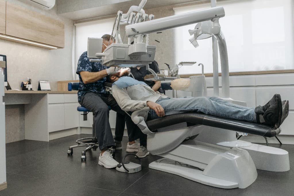 Modern dental clinic with dentist and patient